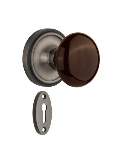 Classic Rosette Mortise-Lock Set with Brown Porcelain Knobs in Antique Pewter.